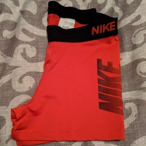 Red Nike pro shorts